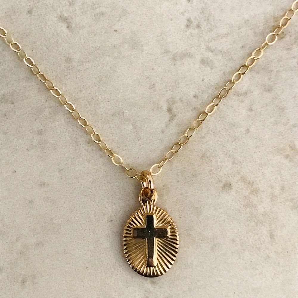 Radiant cross charm necklace